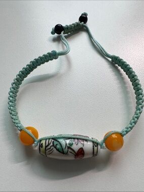 Handcrafted Mint Green Cord Bracelet with Floral Porcelain Bead